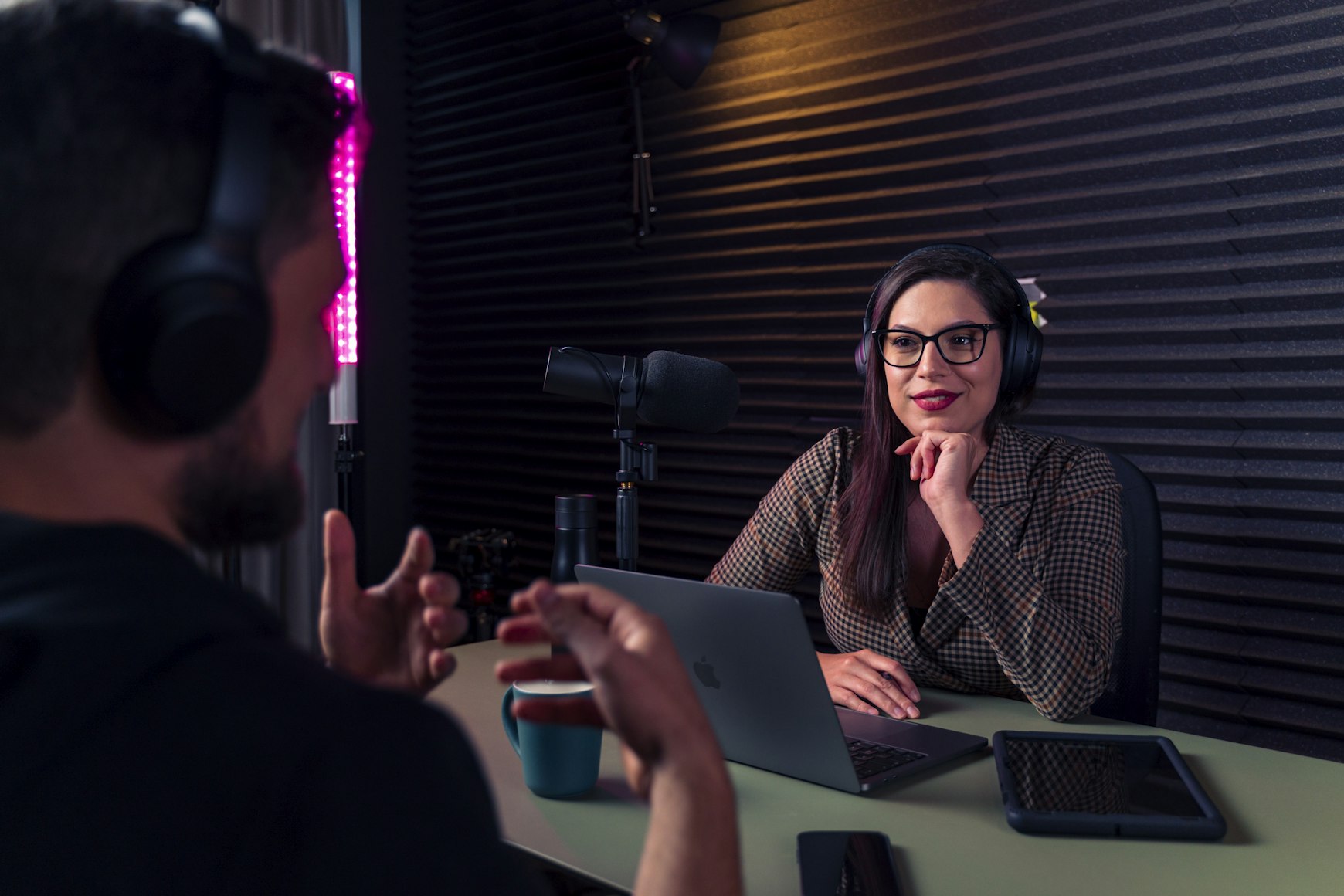 Coach recording in a podcast studio